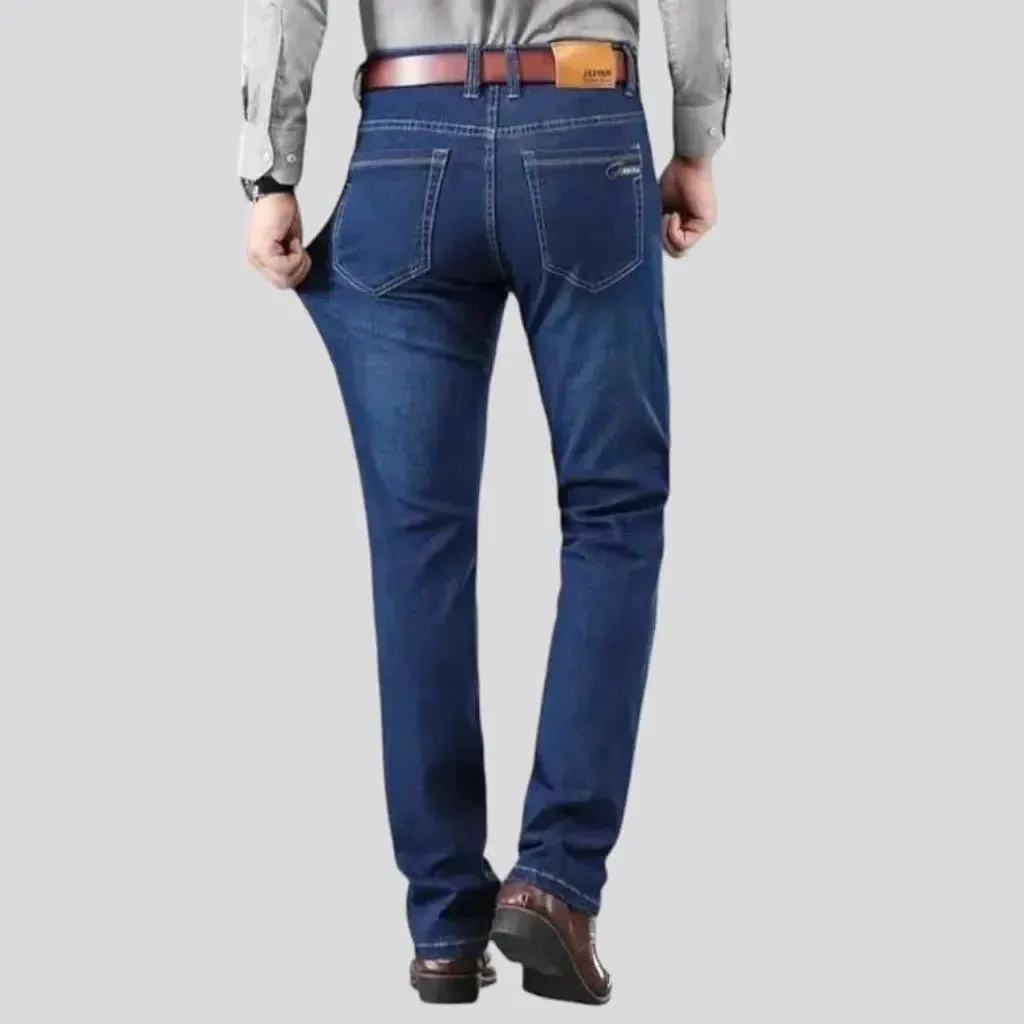 Mid-waist tapered jeans
 for men