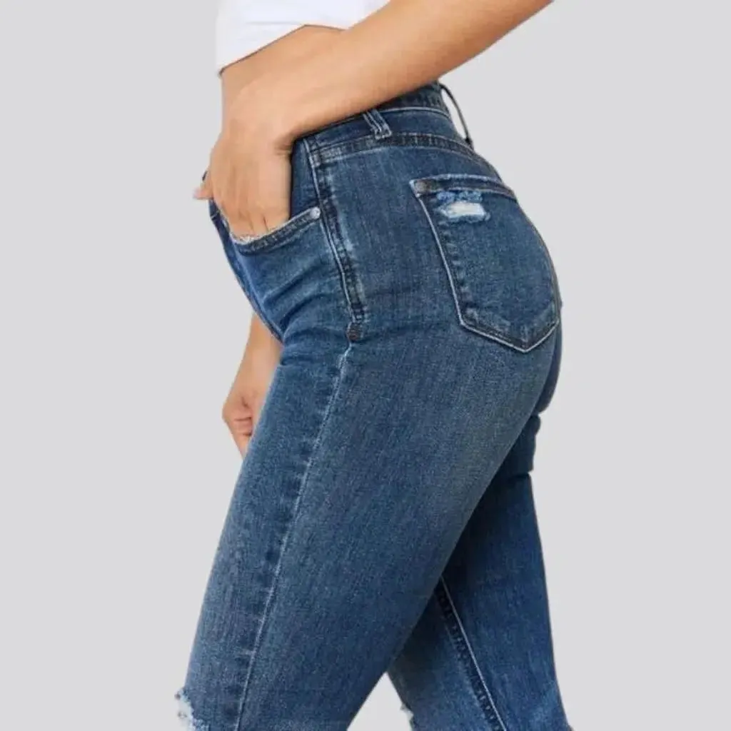 Plus-size whiskered jeans
 for women