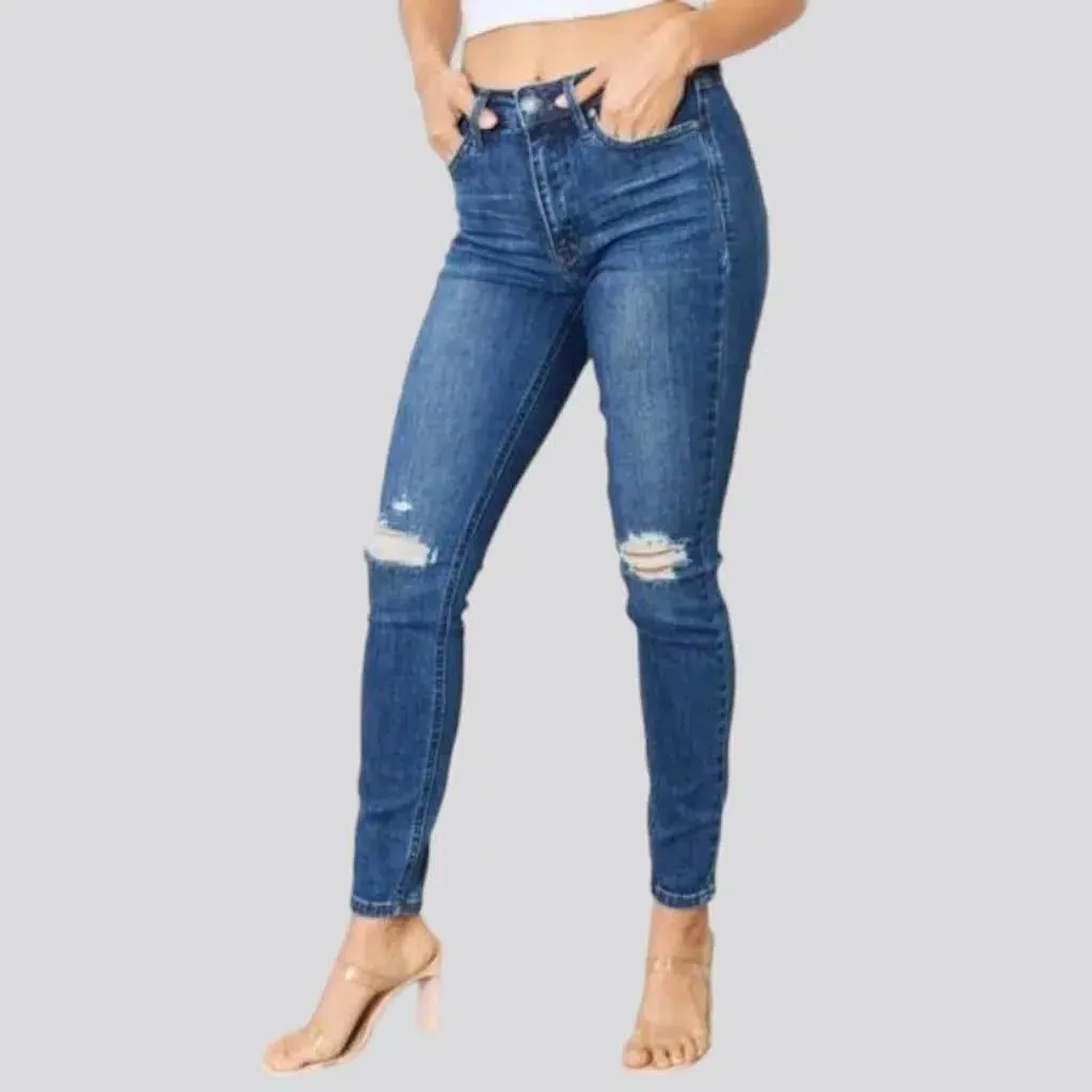 Plus-size whiskered jeans
 for women