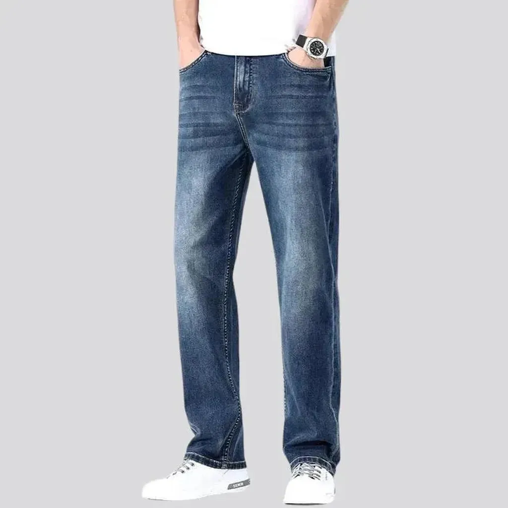 Stonewashed whiskered jeans
 for men